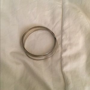 Silver intertwined bangles